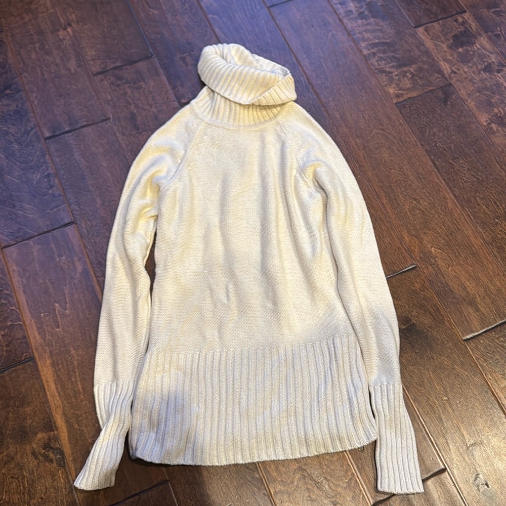 Longer length turtle  neck sweater